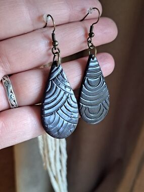 Handcrafted Black Teardrop Earrings with Arched Engraved Detail